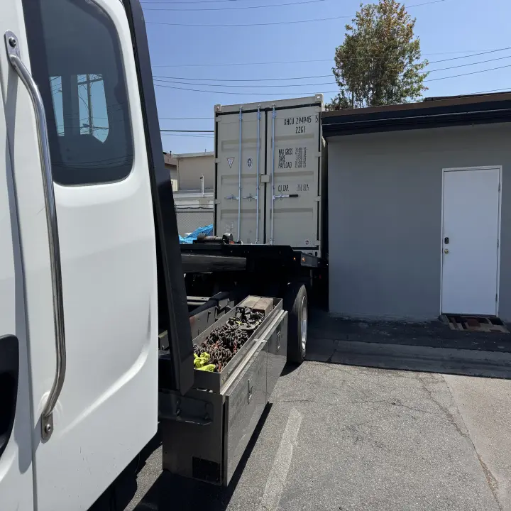 20ft Container Safely Laid Down Via Tilt-Bed Delivery in Costa Mesa, CA - Four Sons Logistics
