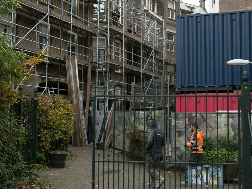 Shipping Containers Used as Storage on a Construction Site - Four Sons Logistics