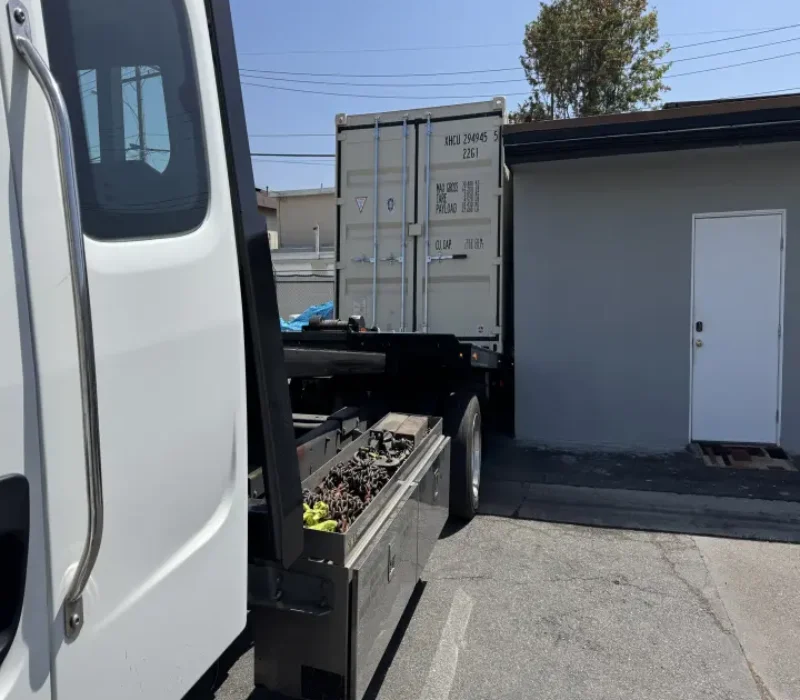 20ft Container Safely Laid Down Via Tilt-Bed Delivery in Costa Mesa, CA - Four Sons Logistics